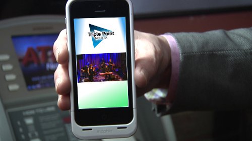 Phone showing video samples of band performing